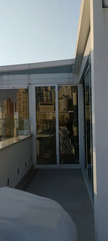 Película nano cerâmica aplicada em sacada de apartamento na Vila Prudente, São Paulo